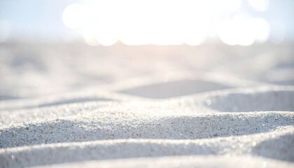 Texture with white sand and sparkling bokeh
