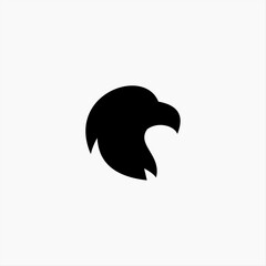 Simple black eagle head silhouette vector icon. Modern, minimalist logo design of a hawk or falcon, symbolizing power, freedom, and vision