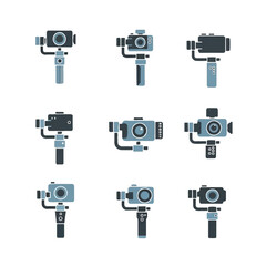 Various camera stabilizers displayed on white surface showcase modern technology and equipment for videography and photography, emphasizing stability and smooth footage.