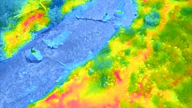Training Video for Infrared SAR Search and Rescue and inspection looking at a mountain stream as seen with heat sensors.