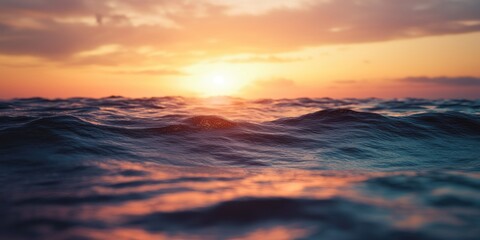 A serene sunset over the ocean with gentle waves and a vibrant sky.