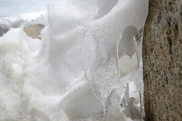 Water dripping from the cliff, frozen beautifully in winter.