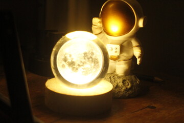 figurine of an astronaut in a white costume