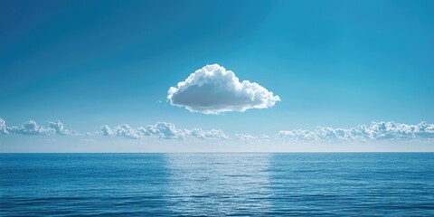 A solitary cloud floats above a vast, calm ocean under a clear, blue sky.