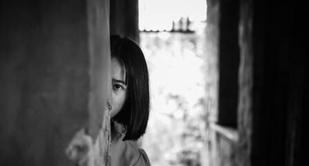Teen girl with eye sad and hopeless. Human trafficking and fear child concept.