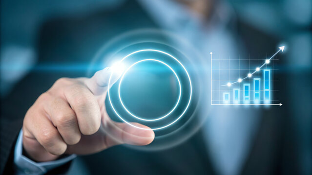 Upcoming new year business goal change digital growth concept with hand touching futuristic interface and rising chart showing progress