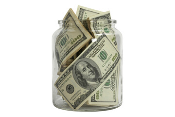 Savings concept with US currency overflowing a glass jar, financial goals