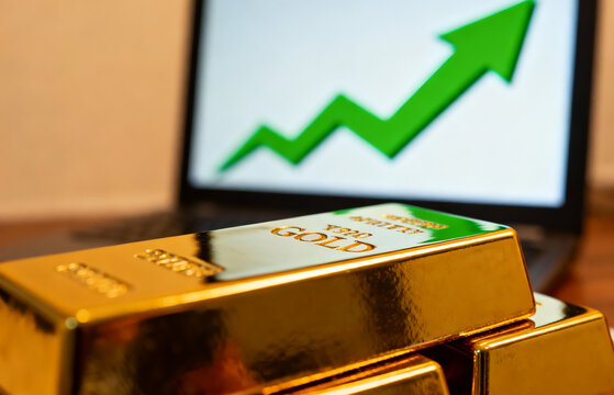 Investment in gold bullion showing positive growth with an upward trend arrow on a stock market chart in the background