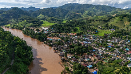 Aerial view of Karen Ruammit Elephant Camp village in Chiang Rai province of Thailand flooded after Kok river rising.