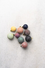 overhead view of vintage Christmas ornaments, top view of antique Christmas tree baubles, pastel Christmas tree decoration