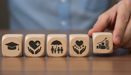 Conceptual wooden blocks depicting life priorities education health family and wealth