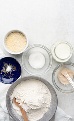 Overhead view of mise en place of ingredients for making english muffin bread, process of making english muffin bread