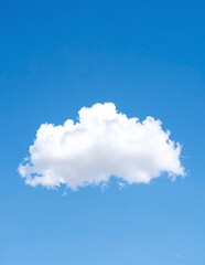 A fluffy white cloud drifts lazily across a bright blue sky, illuminated by the warm sunlight, creating a serene and peaceful atmosphere.