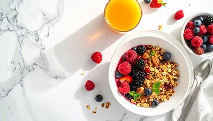 Healthy Granola Bowl with Fresh Berries and Orange Juice