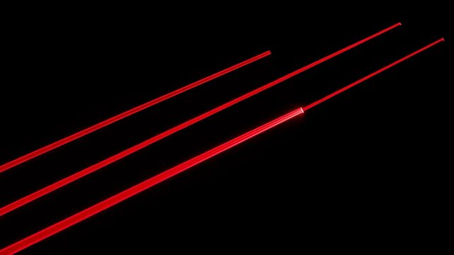 Three parallel, glowing red laser lines slice diagonally across a dark black background, creating abstract light
