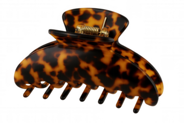 Tortoiseshell hair claw clip securing hairstyles, trendy fashion accessory, hair styling tool, elegant women's item