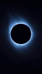 Fototapeta premium Celestial Phenomenon of a Total Solar Eclipse with a Blue Corona.
