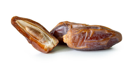 Ripe dried date palm fruits witth half in stack isolated on white background with clipping path Concept of iftar food in Ramadan month for Muslims