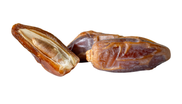 Ripe dried date palm fruits witth half in stack isolated with clipping path. in png file format Concept of iftar food in Ramadan month for Muslims
