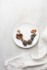 Overhead view of mise en place of ingredients for making Nigerian goat pepper soup, top view of spices for making pepper soup