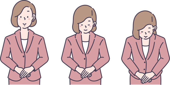 お辞儀をするスーツを着た女性