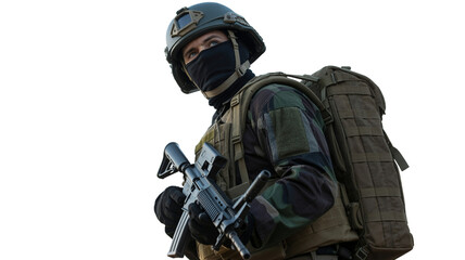 Soldier in camouflage uniform holding rifle looks onward with determination