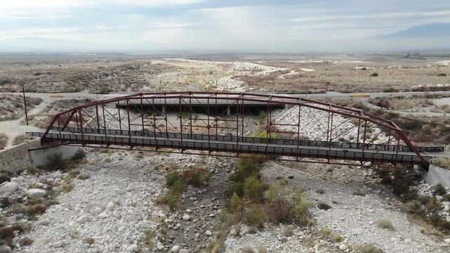 The Greenspot Bridge in Mentone California a Camelback Truss Bridge From a Drone Aerial Vehicle over the Santa Anna River