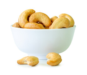 Brown cashew nuts in stack in small white cup isolated with clipping path in png file format