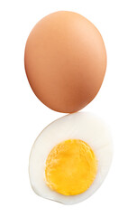 Top view of one raw brown chicken eggs and one boiled or cooked eggs in a half with egg yolk isolated with clipping path in png file format