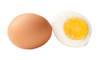 Top view of one raw brown chicken eggs and one boiled or cooked eggs in a half with egg yolk isolated on white background with clipping path