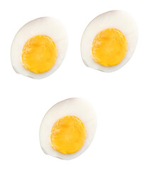 Top view set of unpeeled cooked or boiled chicken eggs in three halves with egg yolks isolated with clipping path in png file format
