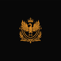 Fototapeta premium Majestic golden Phoenix bird heraldic crest logo crowned with a royal crown and resting on a shield