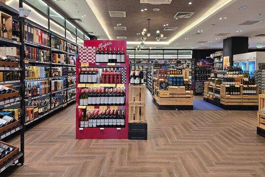 Penang, Malaysia &ndash; Oct 14, 2025: Interior view of the wine and liquor section at Jaya Grocer supermarket, featuring neatly arranged shelves of red wine, white wine and spirits.