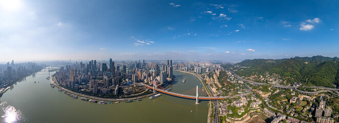Expansive panoramic view of Chongqing, China, showcasing the contrast between the dense downtown...