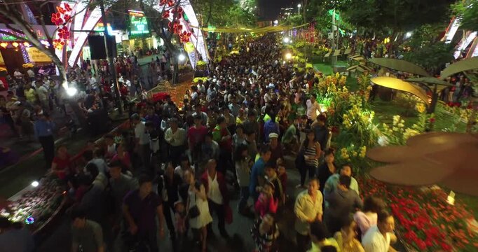 Vibrant Night Festival Crowd in Ho Chi Minh City, Vietnam