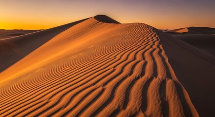 Dramatic sunset over the sand dunes in a vast arid landscape