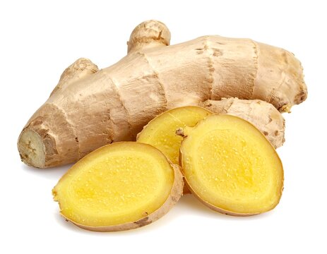 A raw ginger root with two slices cut, highlighting the fibrous interior and textured exterior. The image is a close-up shot, against a white background