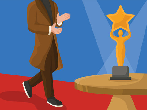 A man applauds and takes the trophy