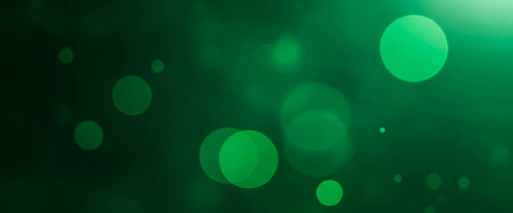 Abstract green background with bokeh effect and light spots, creating a soft glowing atmosphere that evokes freshness, nature, and peaceful light reflections.