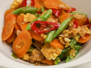 Stir fry vegetables in white bowl