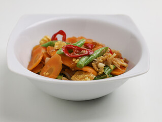 Stir fry vegetables in white bowl