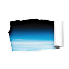 Torn paper reveals vibrant blue sky and clouds with white rolled edge effect isolated on transparent background