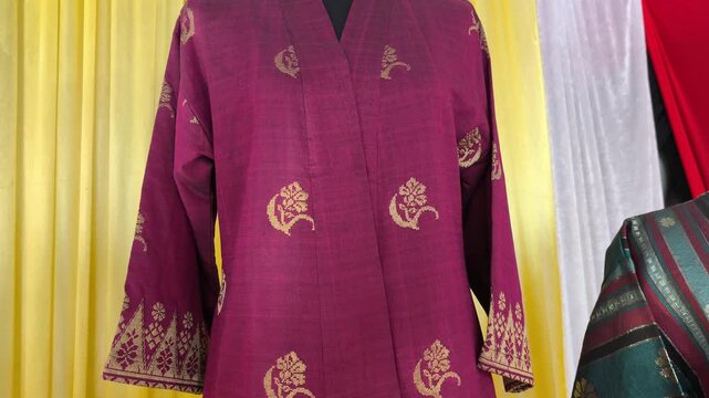 Songket is the basis for the traditional attire of the Negeri Sembilan Malay community. The luxurious hand-woven fabric reflects Minangkabau heritage and is worn for grand ceremonies.