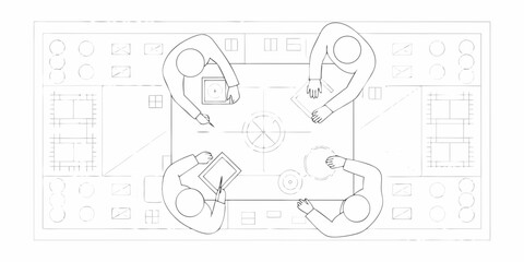 Top down view of four people collaborating around a table with blueprints and digital tablets