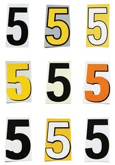 Assortment of number five cutouts on white background for various design concepts