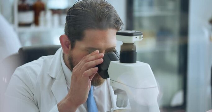 Scientist, man and microscope with investigation for chemistry, testing and medical research. Biotech, laboratory and analysis with DNA inspection for pathology experiment, synthesis and microbiology