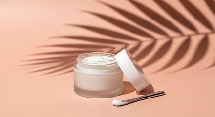 Luxurious Cream Jar with Tropical Leaf Shadow and Soft Peach Background.