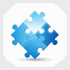 Fototapeta premium Four blue puzzle pieces interlocking symbolizing connection and solutions
