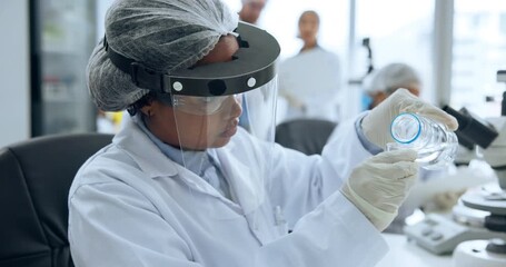 Scientist, woman and chemical analysis with sample for chemistry, testing and medical research. Biotech, laboratory and PPE with DNA inspection for pathology experiment, synthesis or microbiology - Powered by Adobe