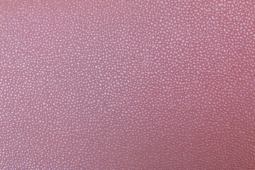 Pink Textured Surface with Small Glossy Patterns — Abstract Soft Background for Design